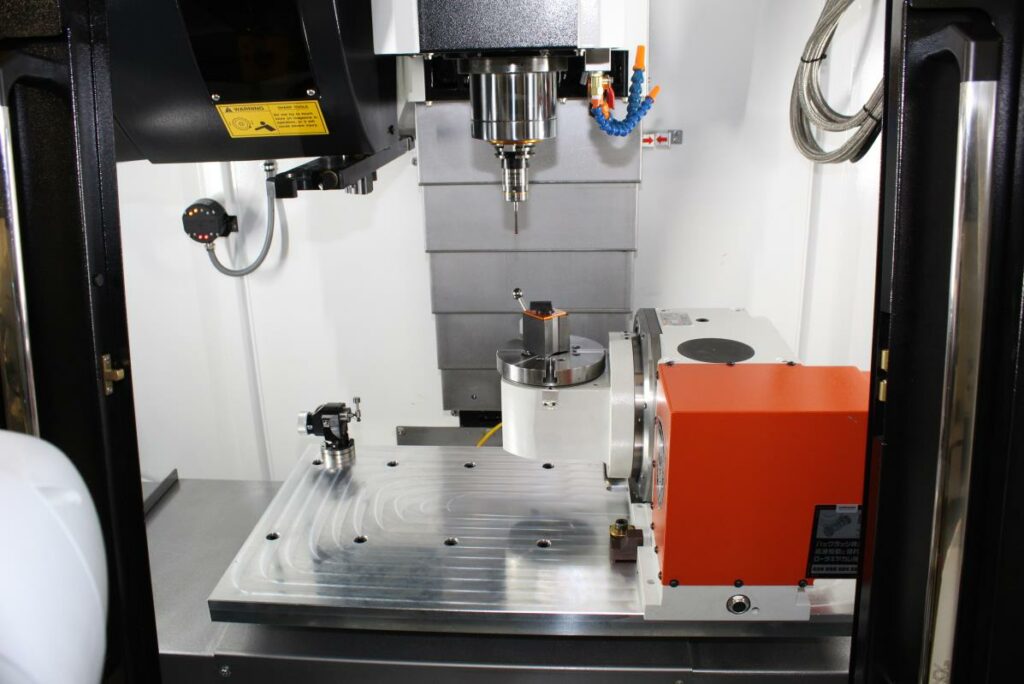 Robotics configuration for a 3-axis high-speed CNC vertical machining center VMC